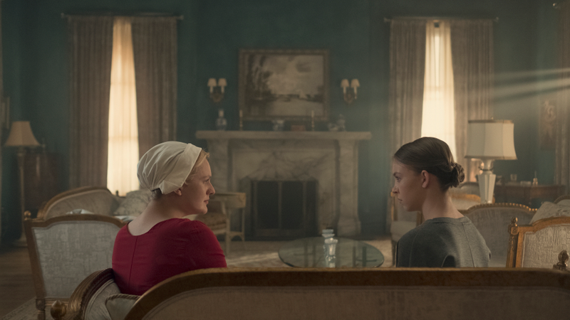 From left to right: June (Elisabeth Moss) and Eden (Sydney Sweeney) discuss Gilead duties.